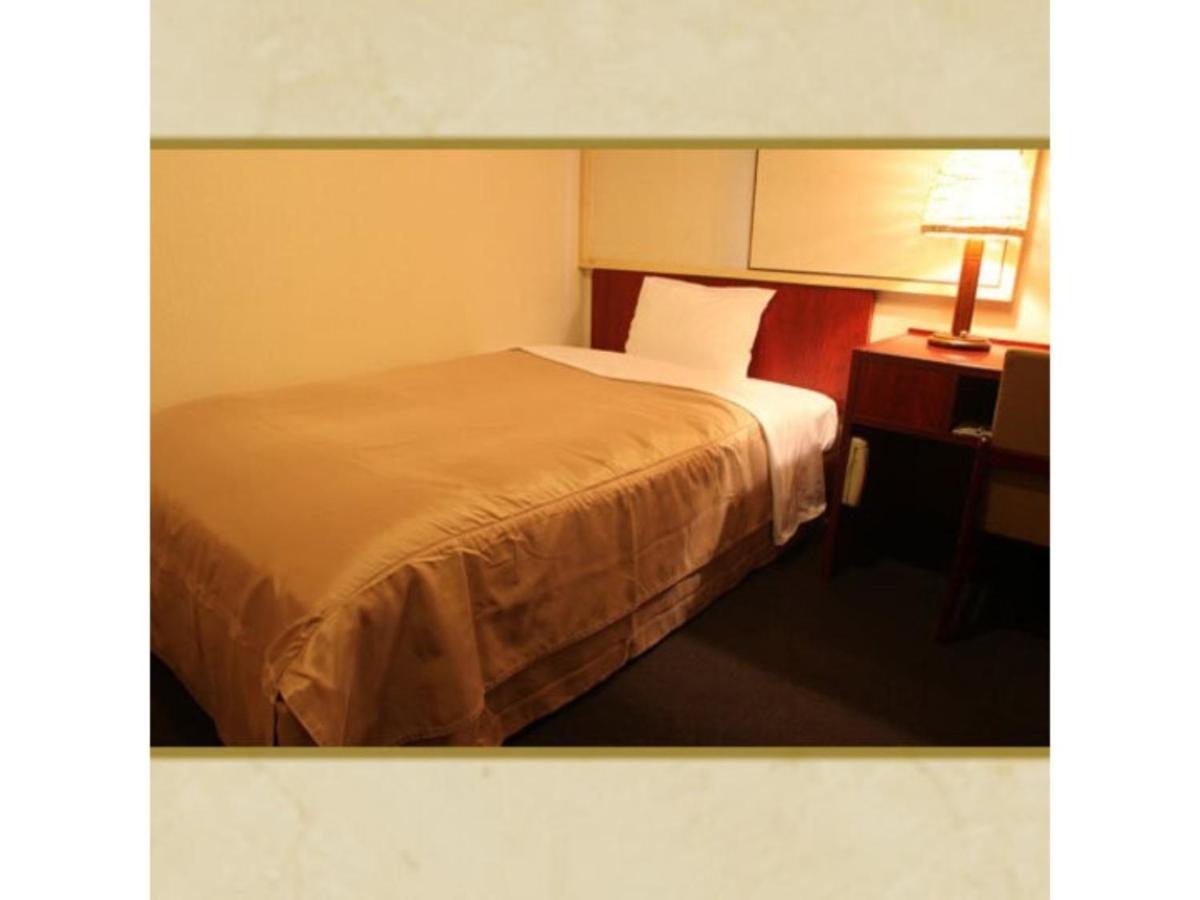 Miyakonojo Sun Plaza Hotel Buitenkant foto